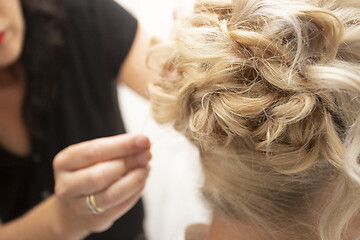 Image showing Bride Getting Styled Up