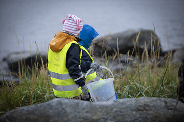 Image showing Picking up Plastic Waste