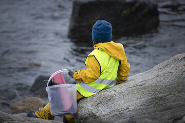 Image showing Picking up Plastic Waste