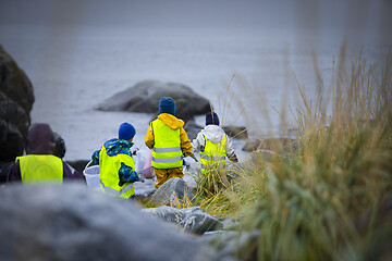 Image showing Picking up Plastic Waste