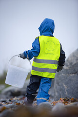 Image showing Picking up Plastic Waste