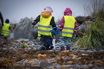 Image showing Picking up Plastic Waste