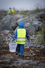 Image showing Picking up Plastic Waste