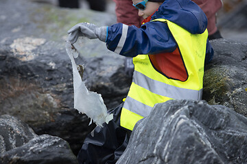 Image showing Picking up Plastic Waste