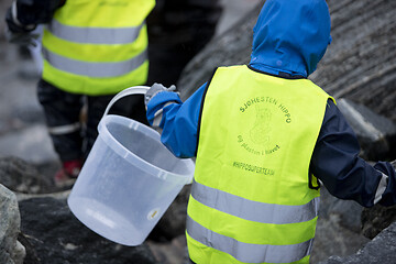 Image showing Picking up Plastic Waste