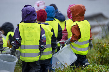 Image showing Picking up Plastic Waste