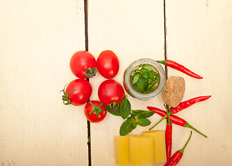 Image showing Italian pasta paccheri with tomato mint and chili pepper