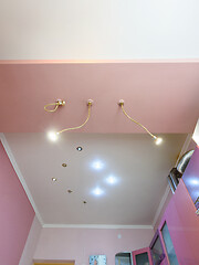 Image showing Fragment of the kitchen interior, view of the matte multi-level ceiling