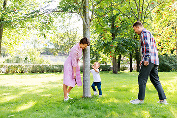 Image showing happy family having fun at summer park