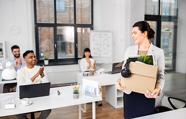 Image showing colleagues applauding to female office worker