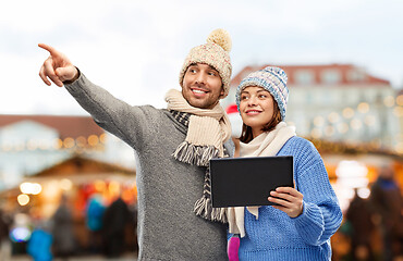 Image showing couple with tablet computer at christmas market