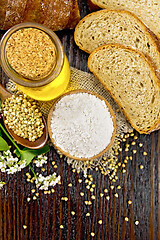 Image showing Flour buckwheat green in bowl with bread on board top