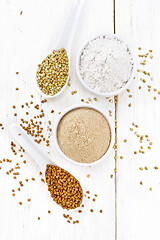 Image showing Flour buckwheat brown and green in bowls on white board top