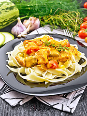 Image showing Pasta with goulash in plate on napkin