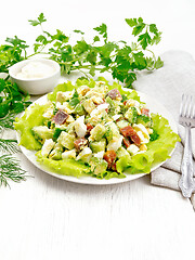 Image showing Salad of salmon and avocado on table