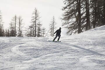 Image showing Skiing in the winter snowy slopes