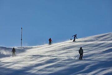 Image showing Skiing slopes with skiers