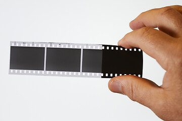 Image showing developed negative film in hand