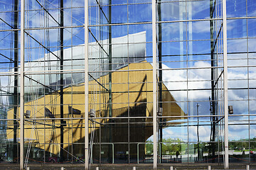 Image showing the building of Central Library Oodi in Helsinki is reflected in