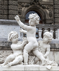 Image showing Playing children statue in Vienna