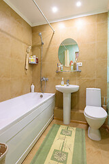 Image showing Interior of an ordinary standard classic bathroom joint with a toilet