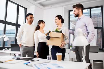 Image showing new female employee meeting colleagues at office