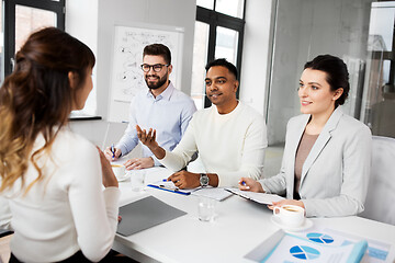 Image showing recruiters having job interview with employee