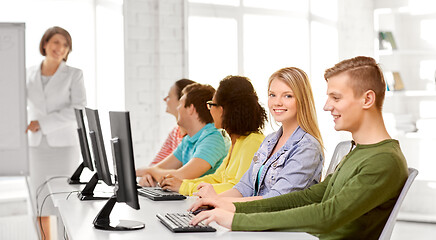 Image showing happy high school students in computer class