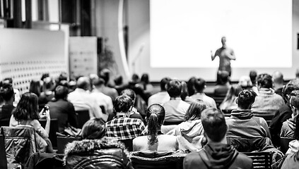 Image showing Business speaker giving a talk at business conference event.