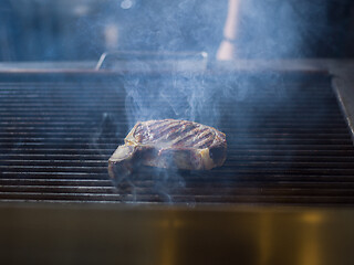 Image showing steak on the grill