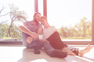 Image showing romantic couple enjoying morning coffee