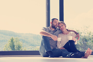 Image showing romantic couple enjoying morning coffee