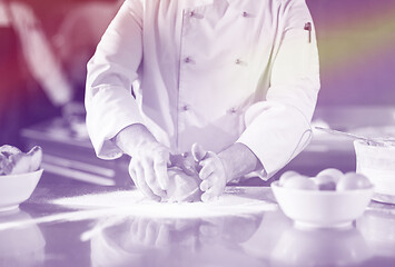 Image showing chef hands preparing dough for pizza