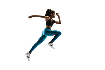 Image showing Young african woman running or jogging isolated on white studio background.