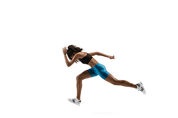 Image showing Young african woman running or jogging isolated on white studio background.