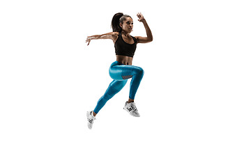 Image showing Young african woman running or jogging isolated on white studio background.