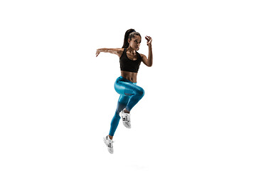 Image showing Young african woman running or jogging isolated on white studio background.