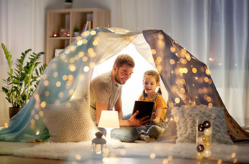 Image showing family with tablet pc in kids tent at home