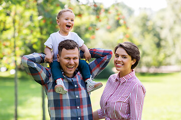 Image showing happy family having fun at summer park