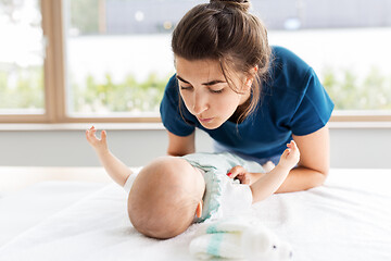 Image showing mother with baby daughter at home