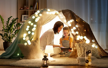 Image showing family with tablet pc in kids tent at home