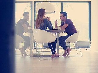 Image showing couple enjoying morning coffee and strawberries