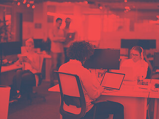 Image showing businessman working using a laptop in startup office