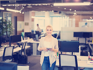 Image showing Business Woman Using Digital Tablet in front of startup Office