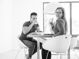 Image showing couple enjoying morning coffee and strawberries