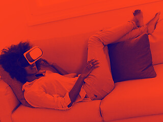 Image showing black woman using VR headset glasses of virtual reality