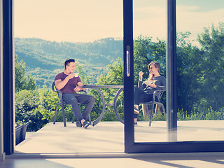 Image showing couple enjoying morning coffee and breakfast