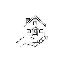 Image showing Hand holding house hand drawn outline doodle icon.