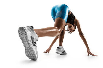 Image showing Young african woman running or jogging isolated on white studio background.