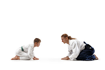 Image showing Man and teen boy at aikido training in martial arts school